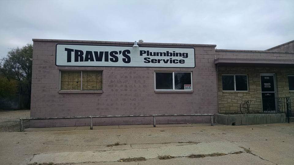The Travis's Plumbing Service shop and sign on West Elm Street in Salina
